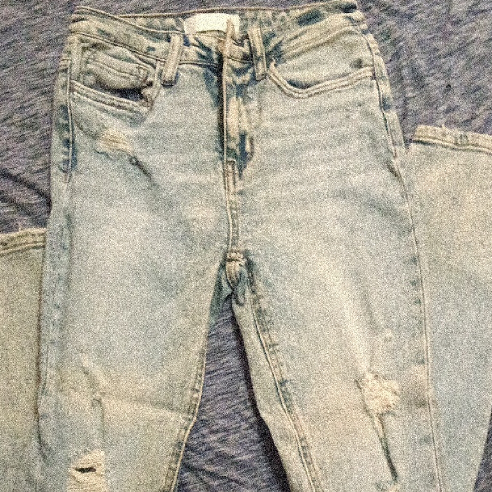 High-Rise Light Blue Skinny Jeans with Subtle Distressing
